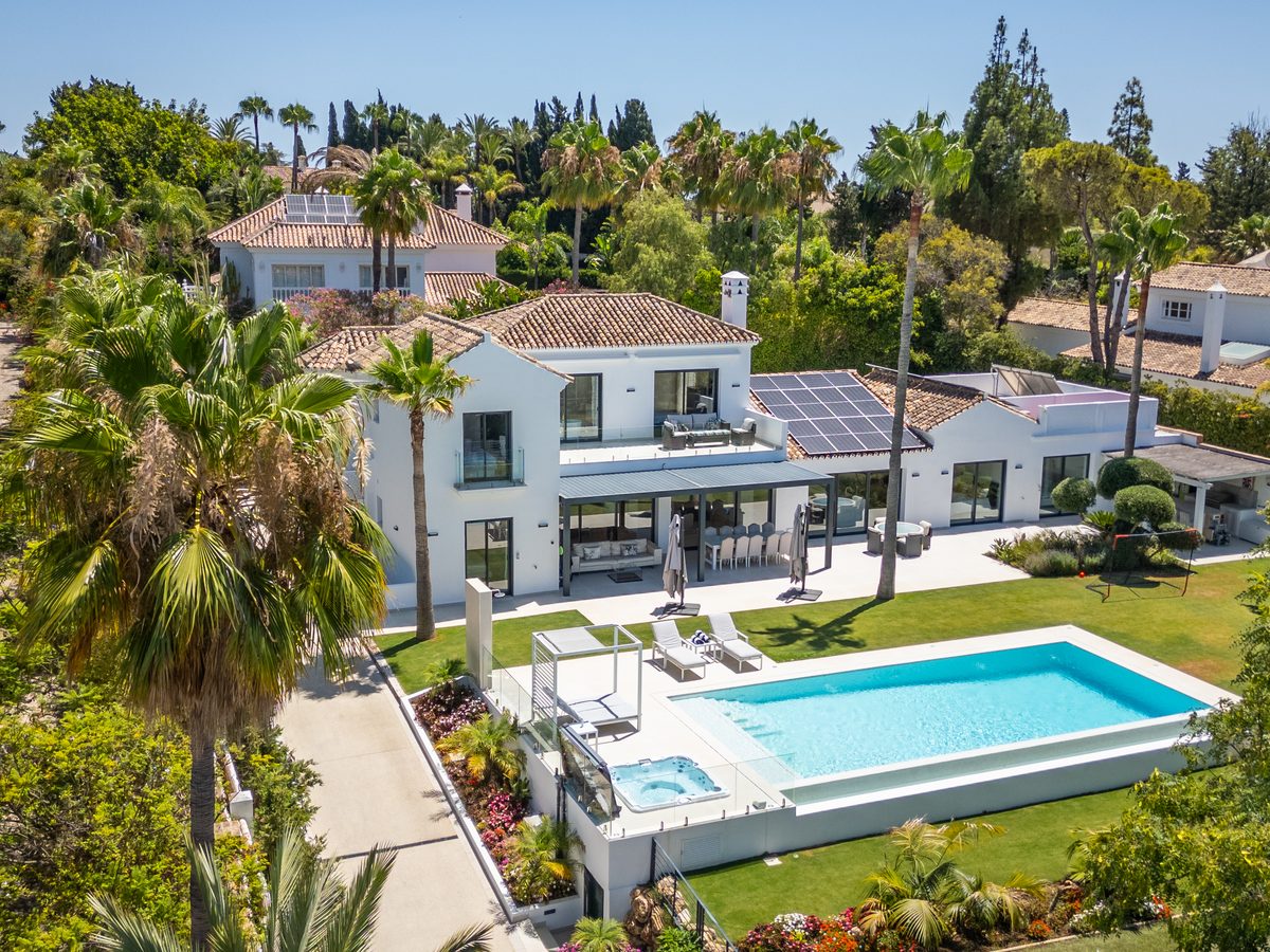 Aerial view of the villa, pool and garden