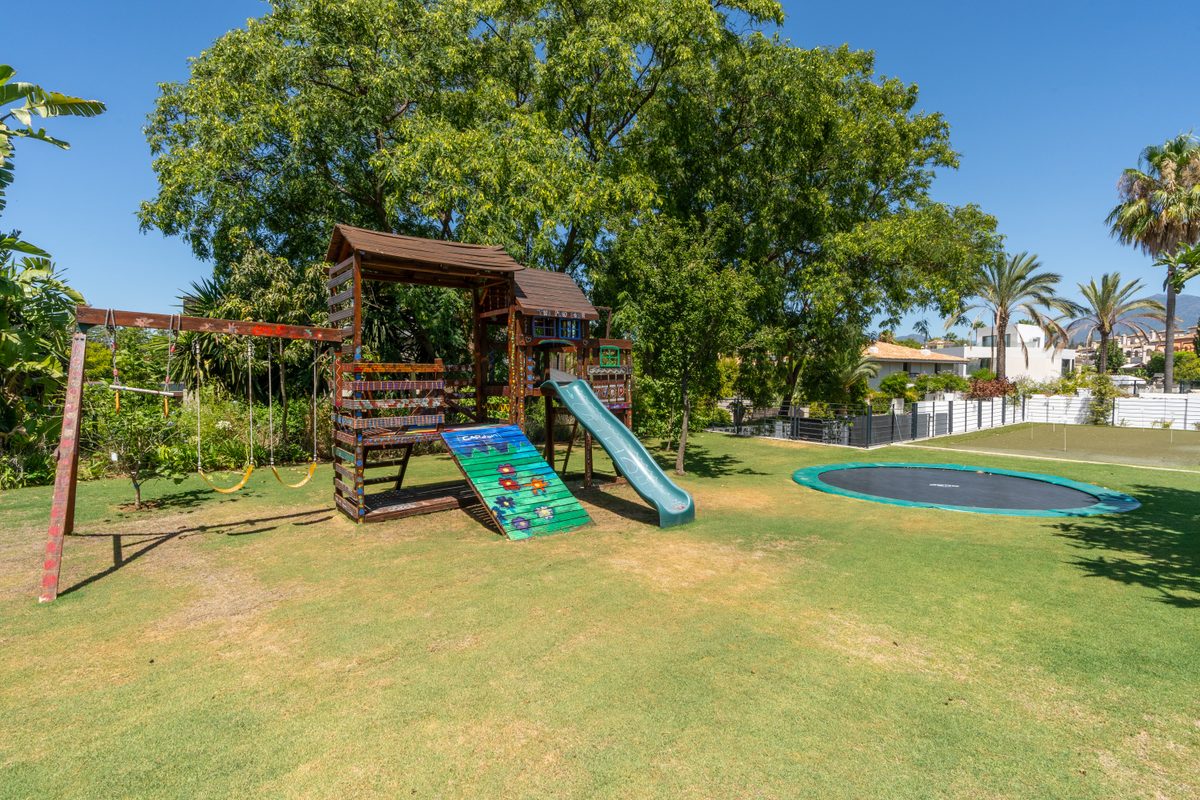 Wooden children's playground in the garden