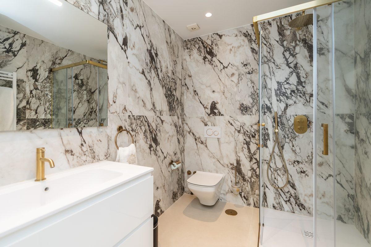 Marble bathroom with walk-in shower