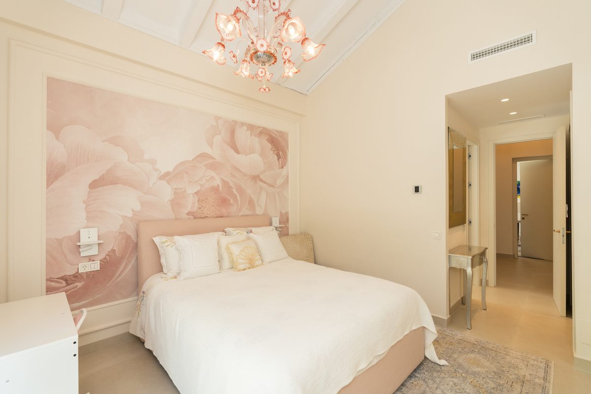 Bedroom with decorative mural
