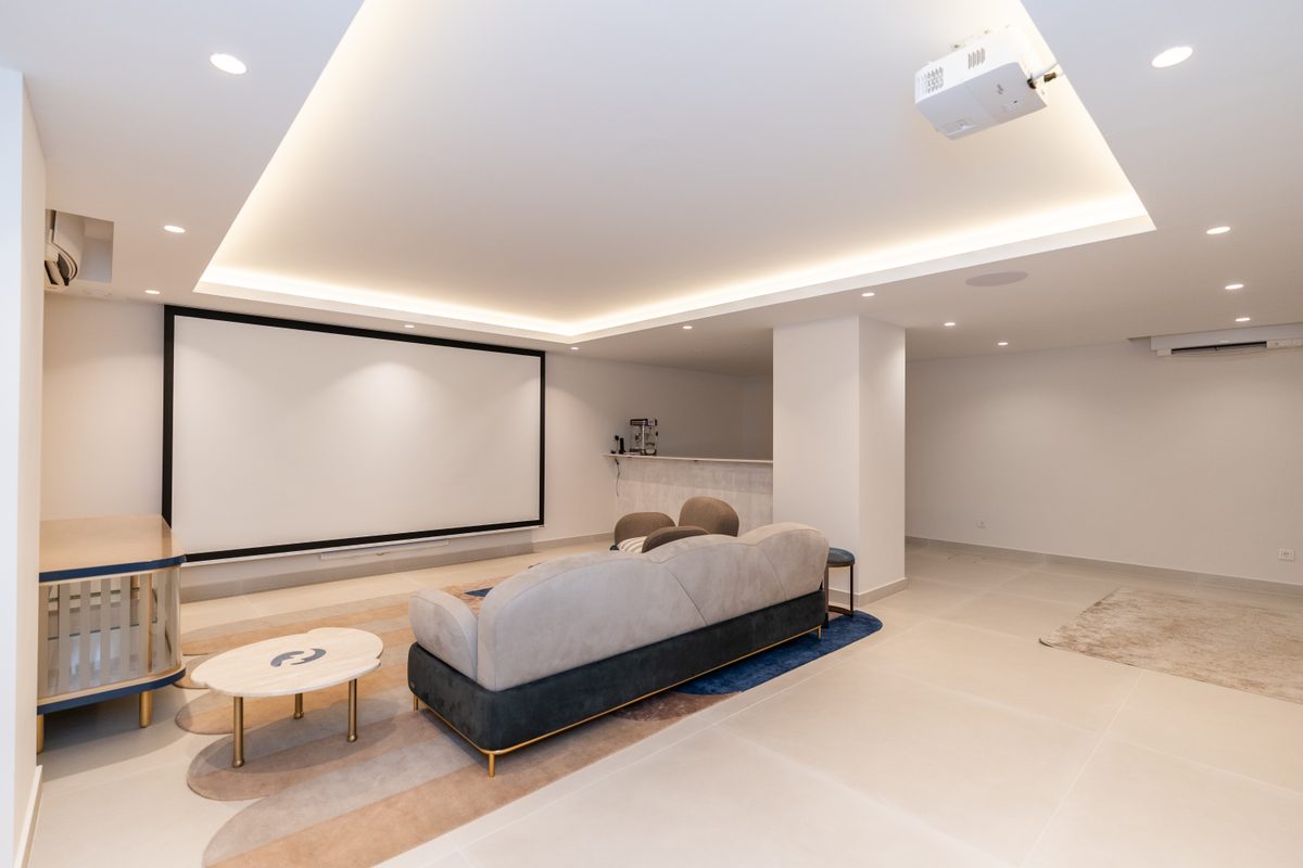 Private cinema room with projection screen